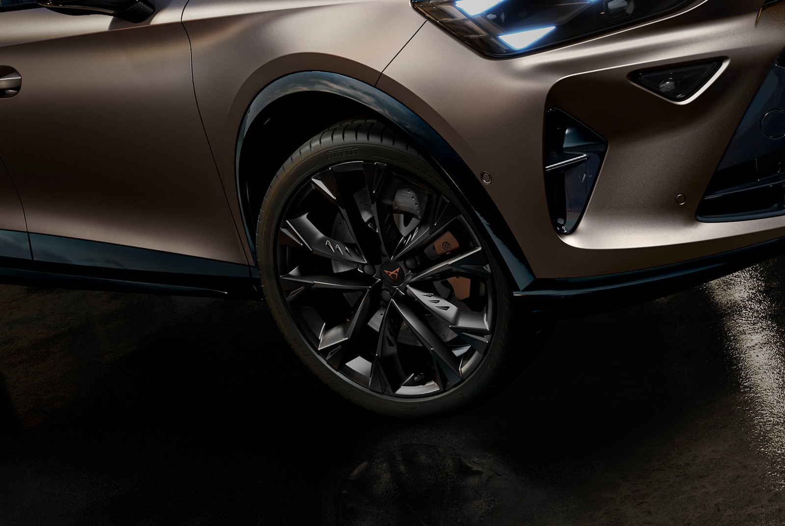 woman-standing-next-to-the new CUPRA Formentor  with brembo brakes and alloy wheels in copper