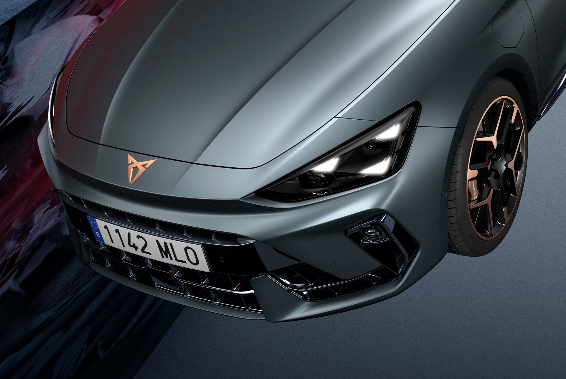 Front view of the new Cupra Leon 2025 hybrid car advanced steering and dynamic chassis control in action, blurred cityscape background at sunset.