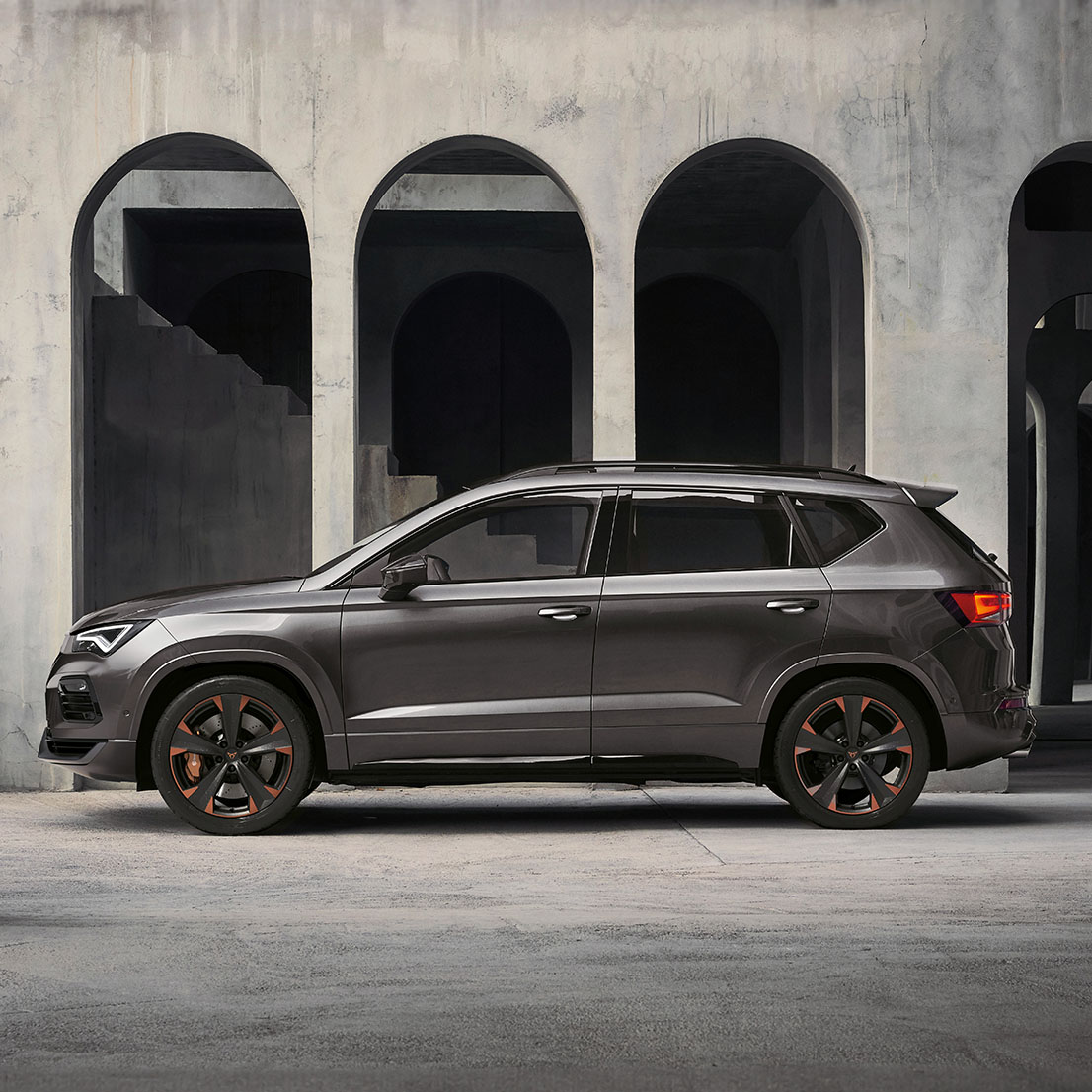 CUPRA driver leaning on his CUPRA Ateca